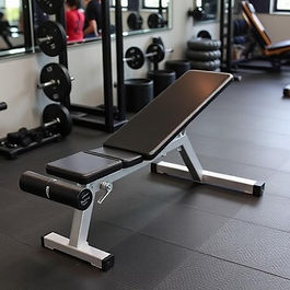 A black adjustable workout bench
