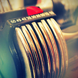 Close-up image of adjustable dumbells