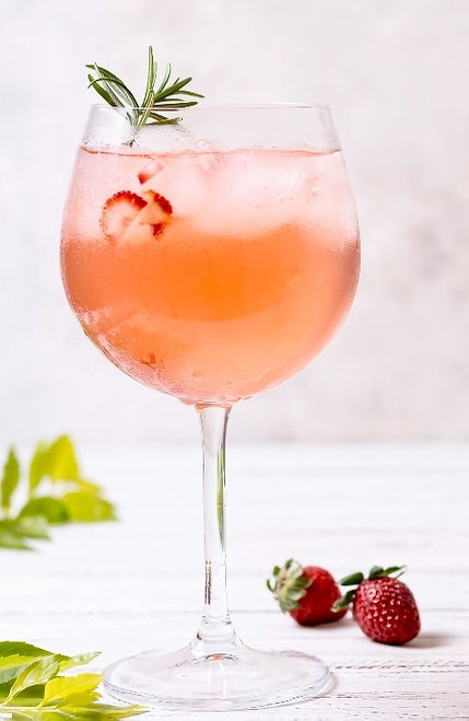 OTC Strawberry spritz - Cocktail On The Cusp recipe with rosé wine into a iced tulip glass