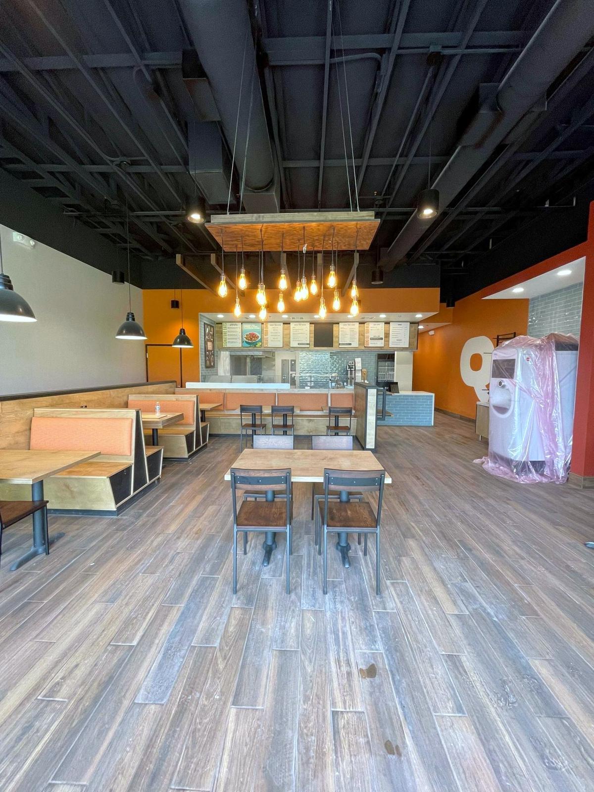 Qdoba dining room with exposed ceiling and pendant lights, restaurant tenant improvement, Las Vegas