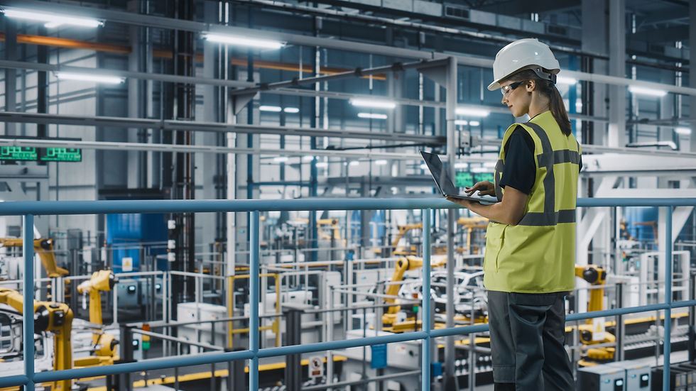 female-car-factory-engineer-high-visibility-vest-using-laptop-computer-automotive-industri