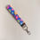 Thumbnail: Blue Colorful Flower with glitter Wristlet