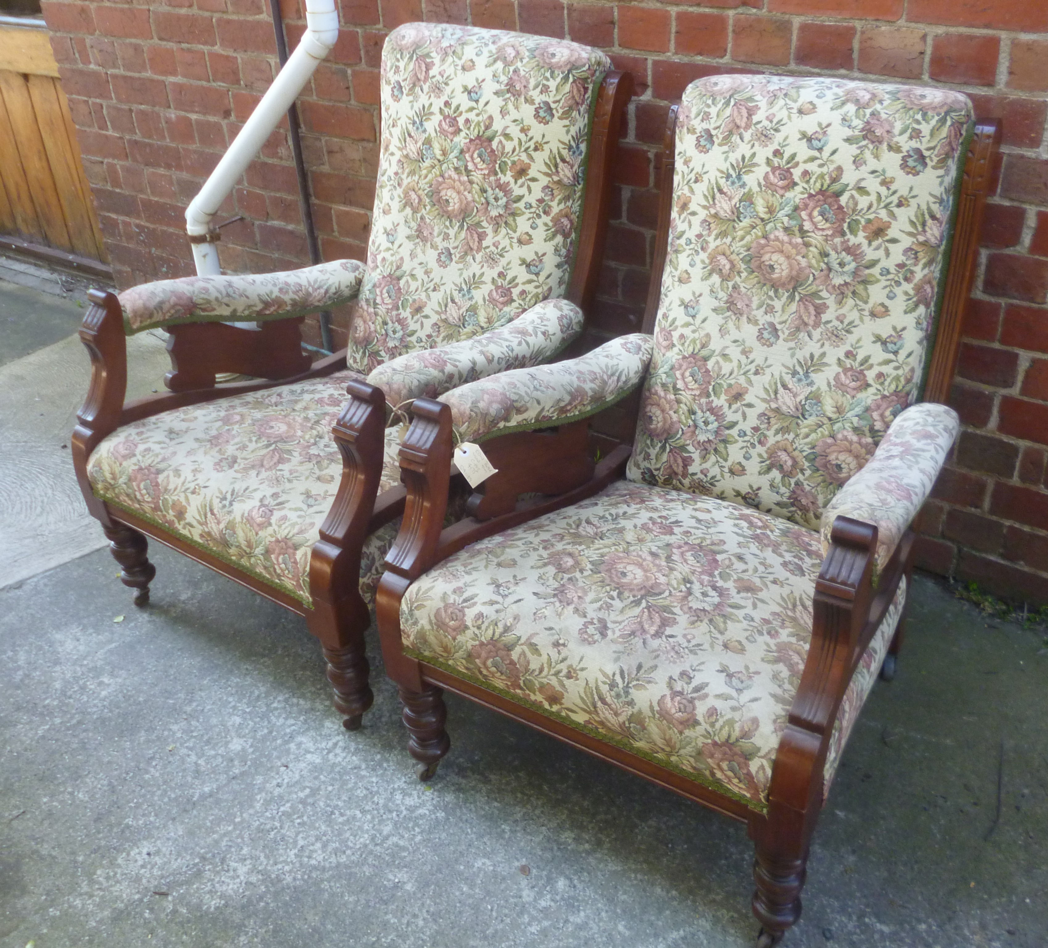 Pair of Edwardian blackwood arm chairs