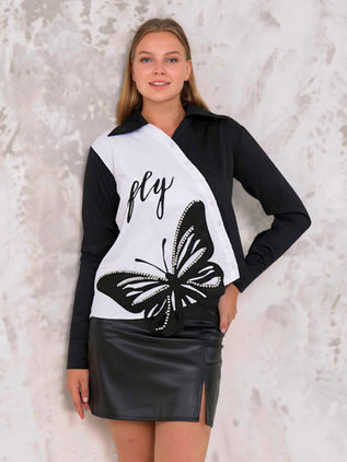 Asymmetrical women's white shirt with cutouts , printed and embroidered with colored stones. Design by Samanta X