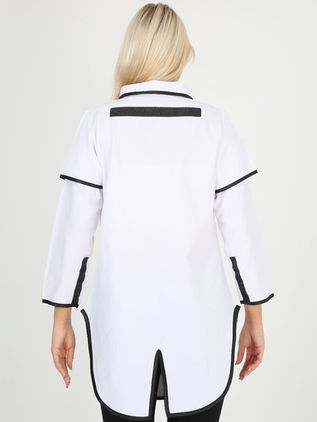Women's asymmetrical white shirt with Wanted print and black pockets. design by Samanta X