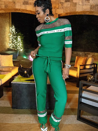 Women's green set with fabric details with rhinestones and silver logo. Design by Samanta X for the Gritty Soul brand