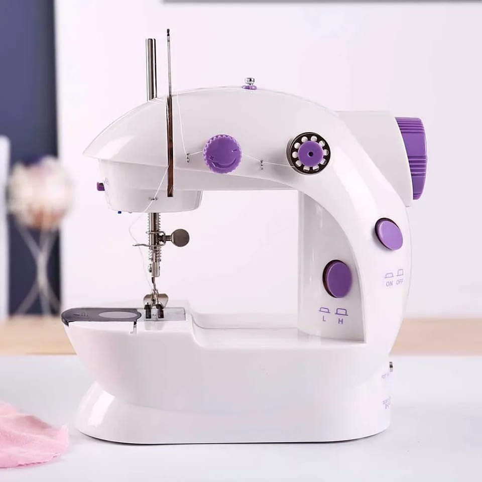 Miniatura: Maquina de coser