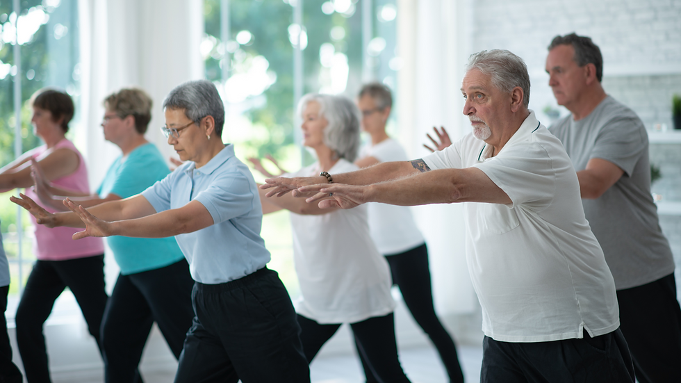 A group of seniors in a tai chi class
