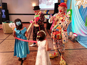 Professional clown performing interactive comedy and games at kids birthday party, KidsPartyBKK entertainers.