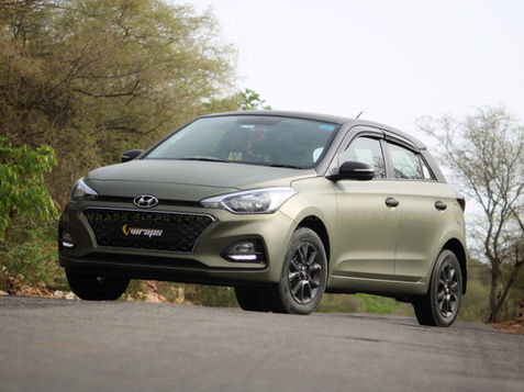hyundai i20 matte metallic midnight sand green wrap front view