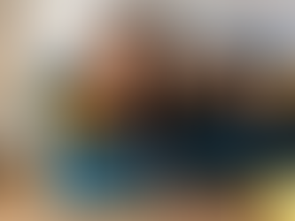 Dom/sub couple in a BDSM lifestyle, sexy couple on couch