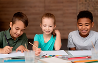 medium-shot-happy-kids-painting.png