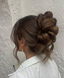 Modern textured French twist bridal hairstyle with soft movement and volume, created by Brook Mae, Colorado Springs and Castle Rock wedding hairstylist.