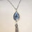 Thumbnail: Contemporary Silver Tassel Necklace with Mirror Glass Accent