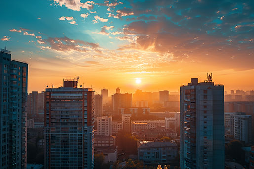 City skyline of high rise commercial and residential buildings at sunrise
