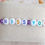 Miniature : Bracelet enfant réglable lettres, perles heishi « I KISS YOU »