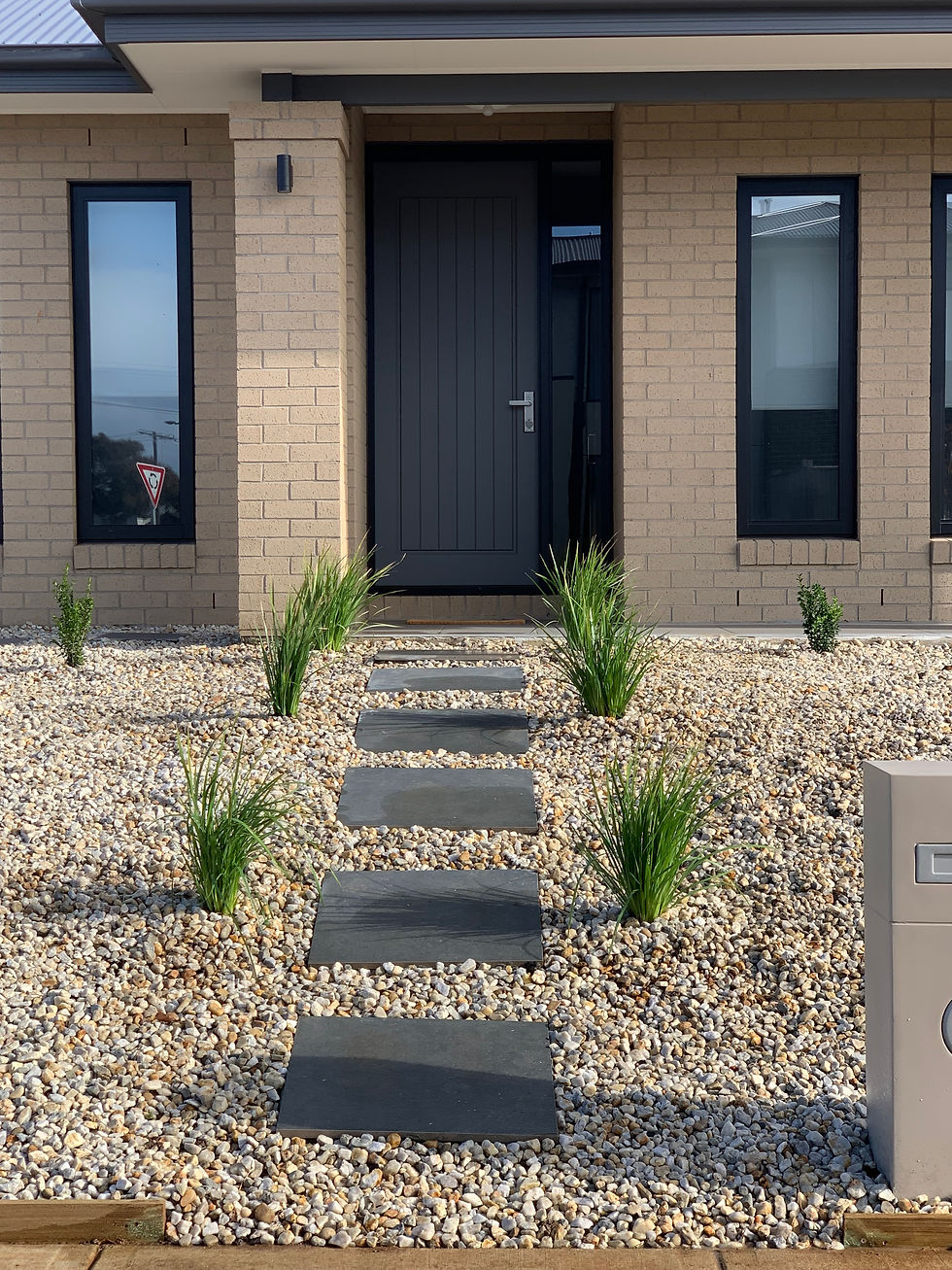 Landscaping projects by MDG Construction in Geelong, Australia. Custom outdoor spaces featuring natural stone, retaining wall