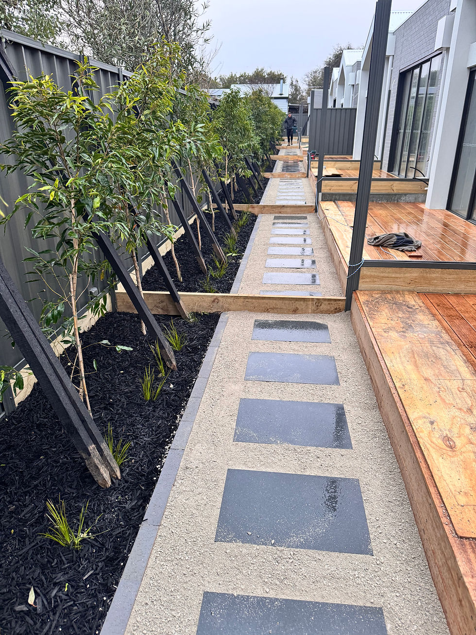 Landscaping projects by MDG Construction in Geelong, Australia. Custom outdoor spaces featuring natural stone, retaining wall