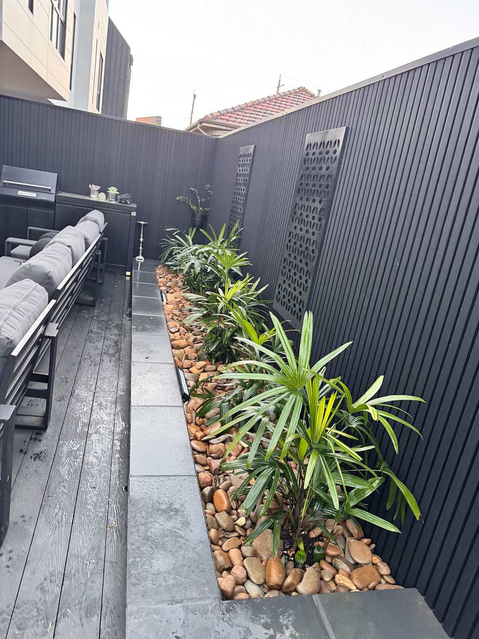 Landscaping projects by MDG Construction in Geelong, Australia. Custom outdoor spaces featuring natural stone, retaining wall