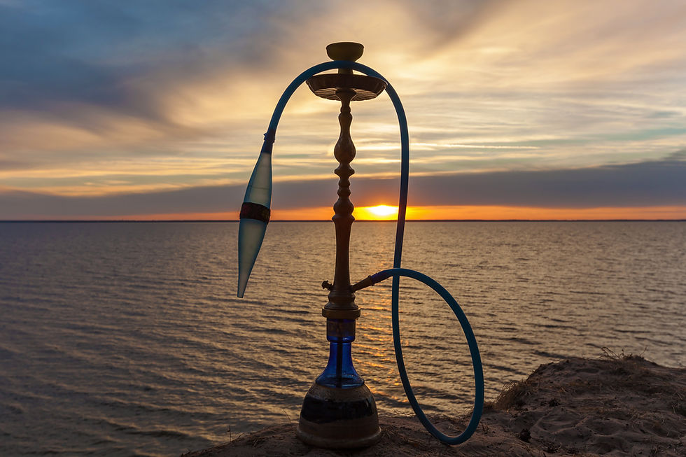 hookah-against-sky-water-sunset-standing-sand.jpg