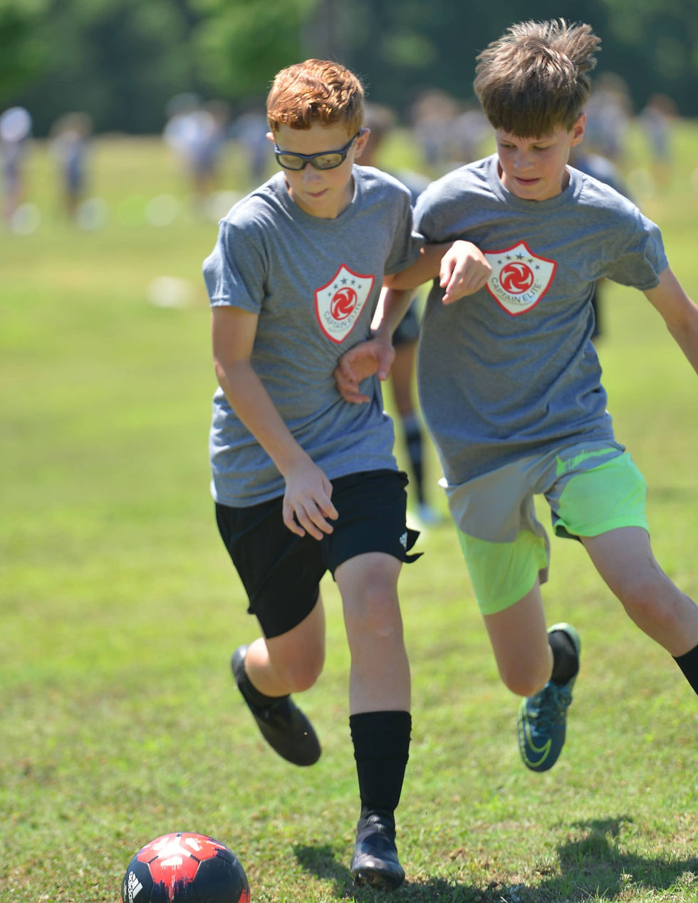 Male Players Compete at Captain Elite Soccer Camp