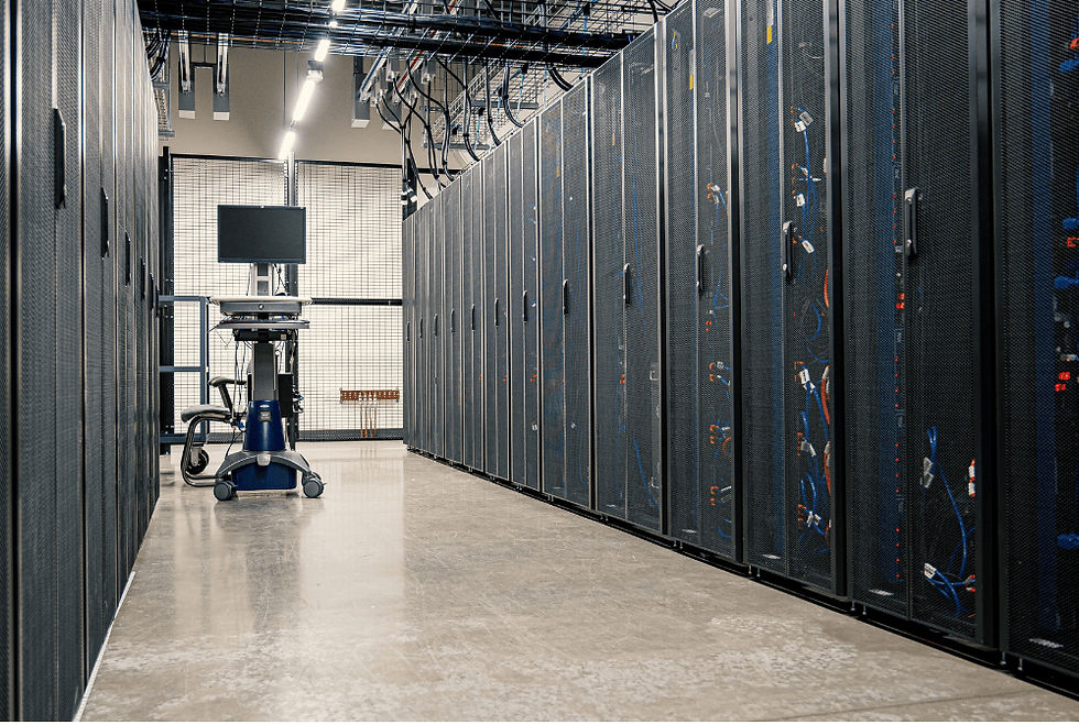 a hallway in a data centre showing a row of server racks