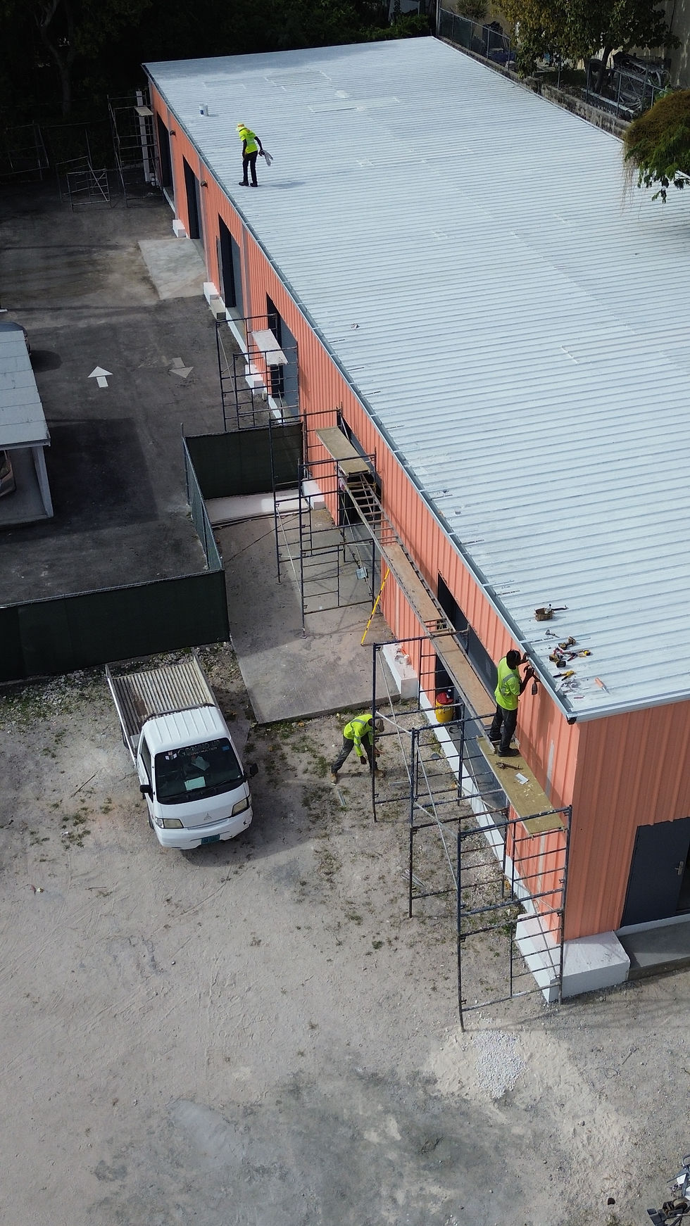 Warehouse Gutter & Downspouts - Integrity Roofing & Construction