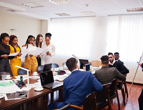 diverse-business-people-meeting-round-table.jpg