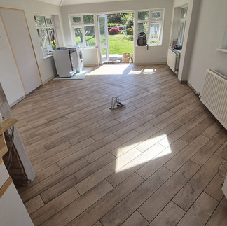 completed porcelain wood-effect tiled floor laid at 45 degrees