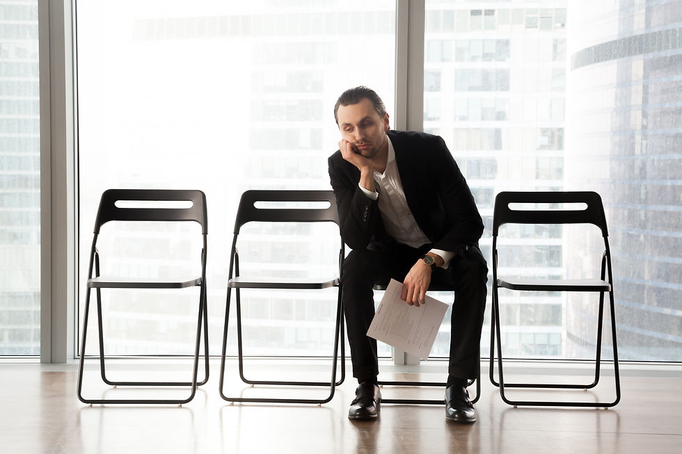 bored-young-man-suit-sitting-waiting-room.jpg