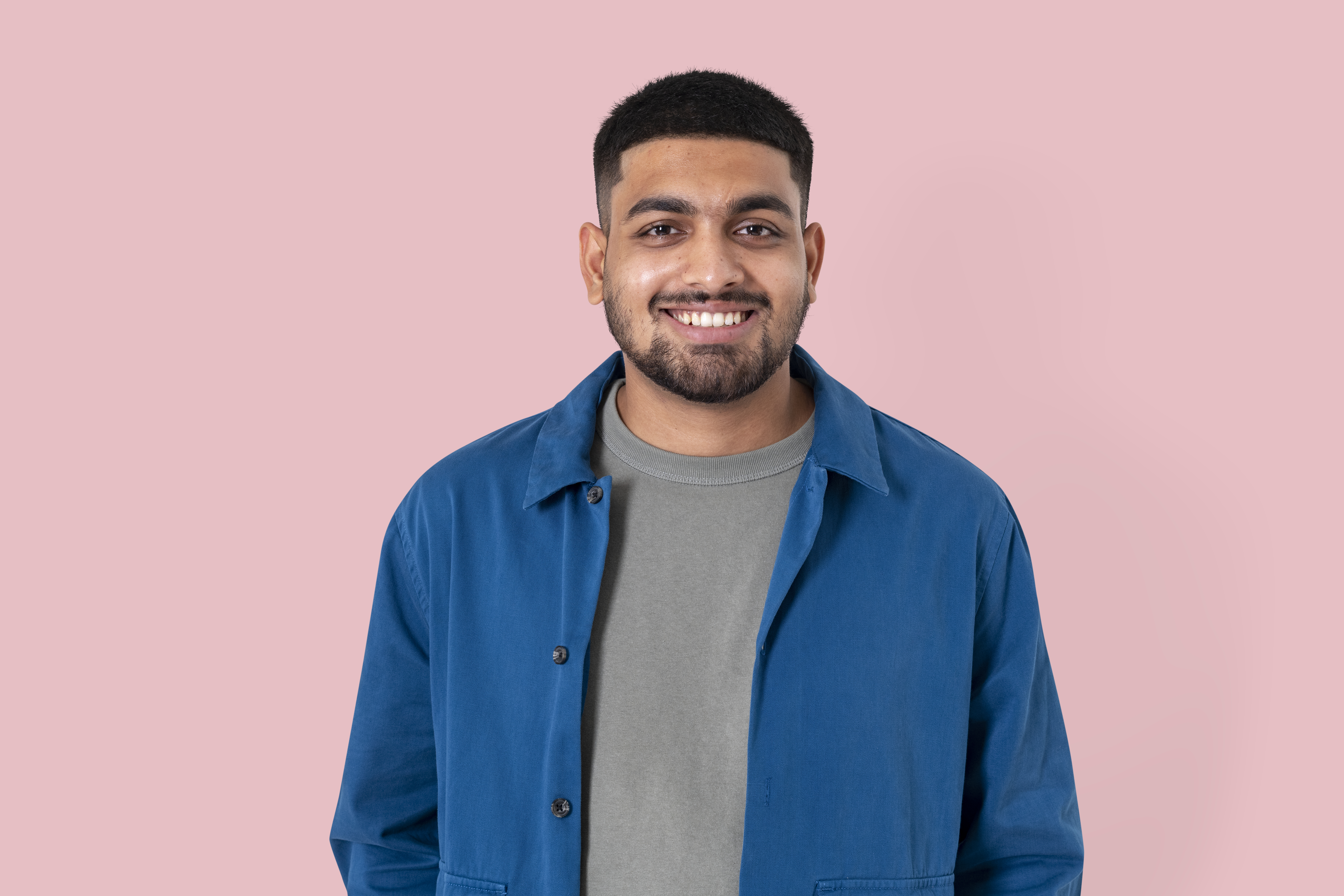 indian-man-smiling-cheerful-expression-closeup-portrait.jpg