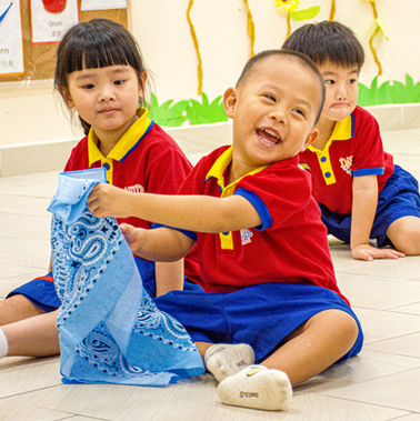 Music and Movement class lets kids not only dance, but use cloths and ribbons to enhance their playtime.
