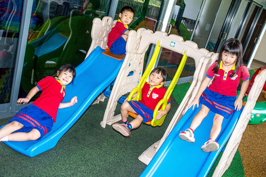 Kindergarten kids play in the open-air playground on DGP premises weekly.
