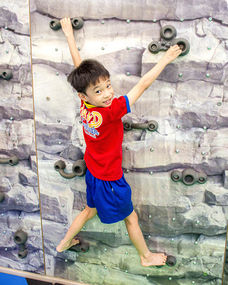 Kids' Power Gym comes with a short in-built rock wall too!
