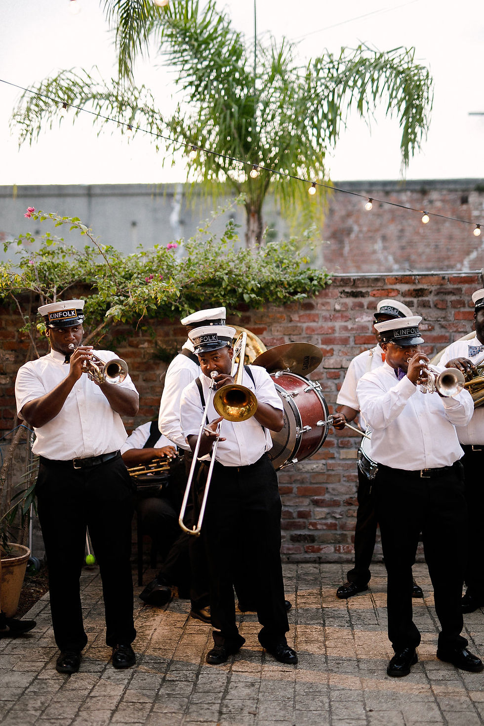New Orleans Wedding with Ruby and Pearl Events, Kaylynn Marie Photography, Antigua Florals + Styling, Lovegood Wedding & Event Rentals , Kinfolk Brass Band at Race & Religious / Vintage Decor, Lounge Space, and Classic Farm Tables