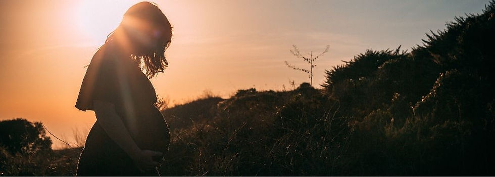 women at sunset