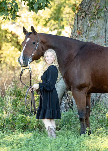 western cowgirl senior portraits with dress and cowgirl boots wisconsin by Forest Road Photography