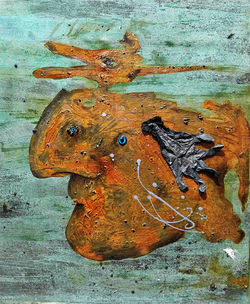 ugly duckling 2, 72.7cm x 60.6cm, Bronze and iron corrosion, latex gloves, Plastic, epoxy on canvas