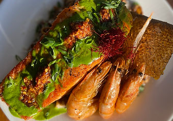 pan seared salmon and prawns w.Cilantro Crema & Chili Oil