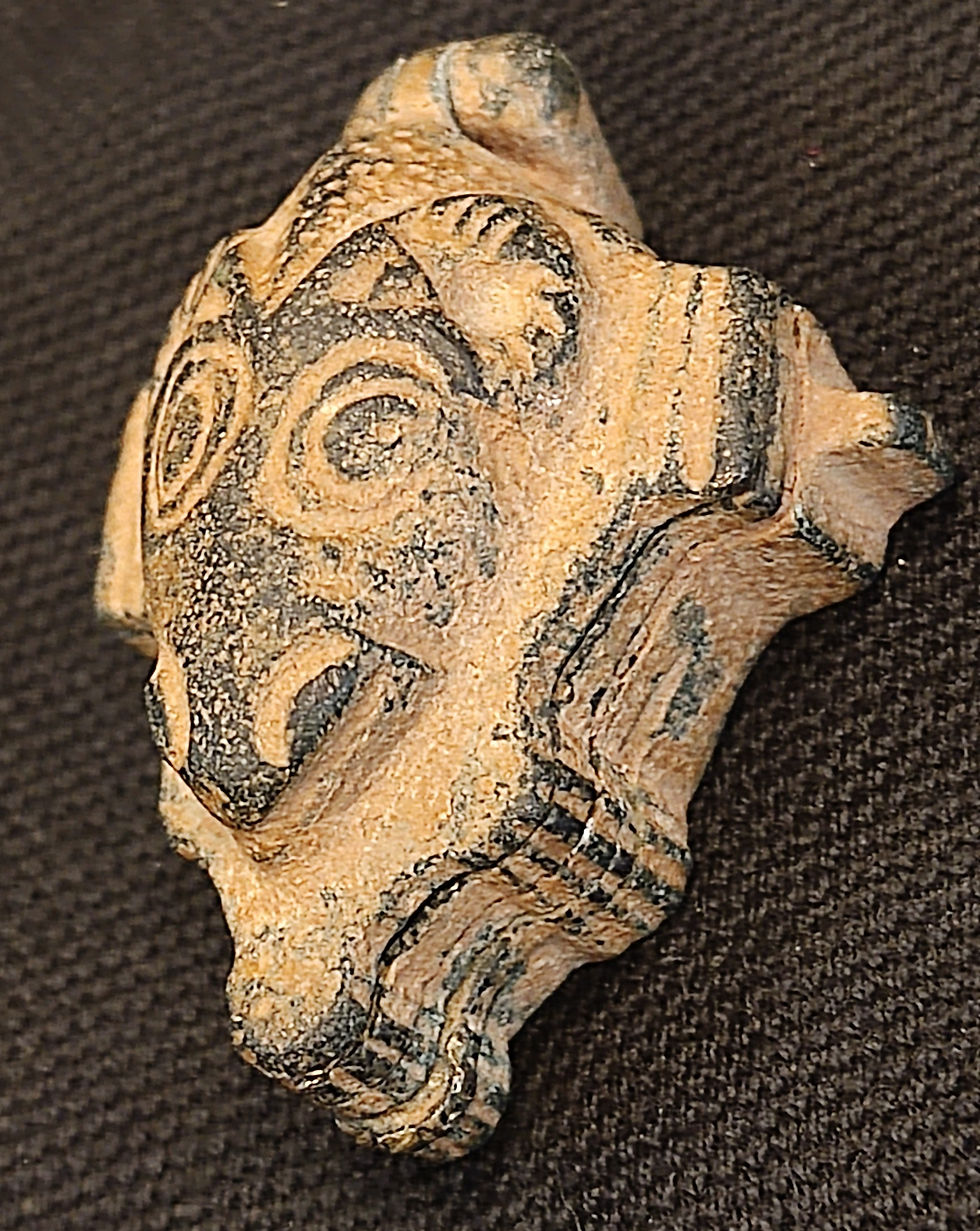 Roman goat face