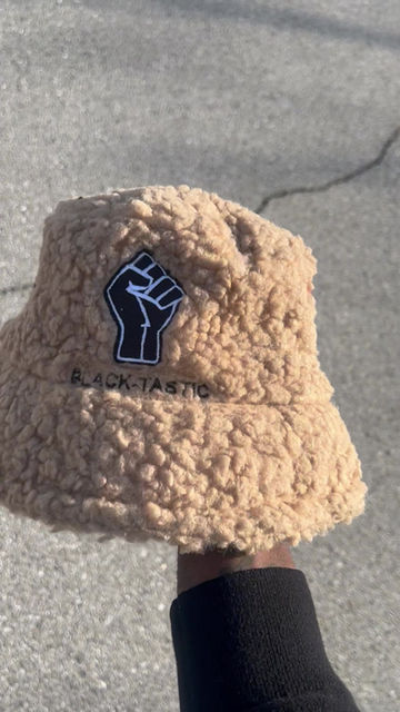 Thumbnail: Cozy Black Power Bucket Hats!