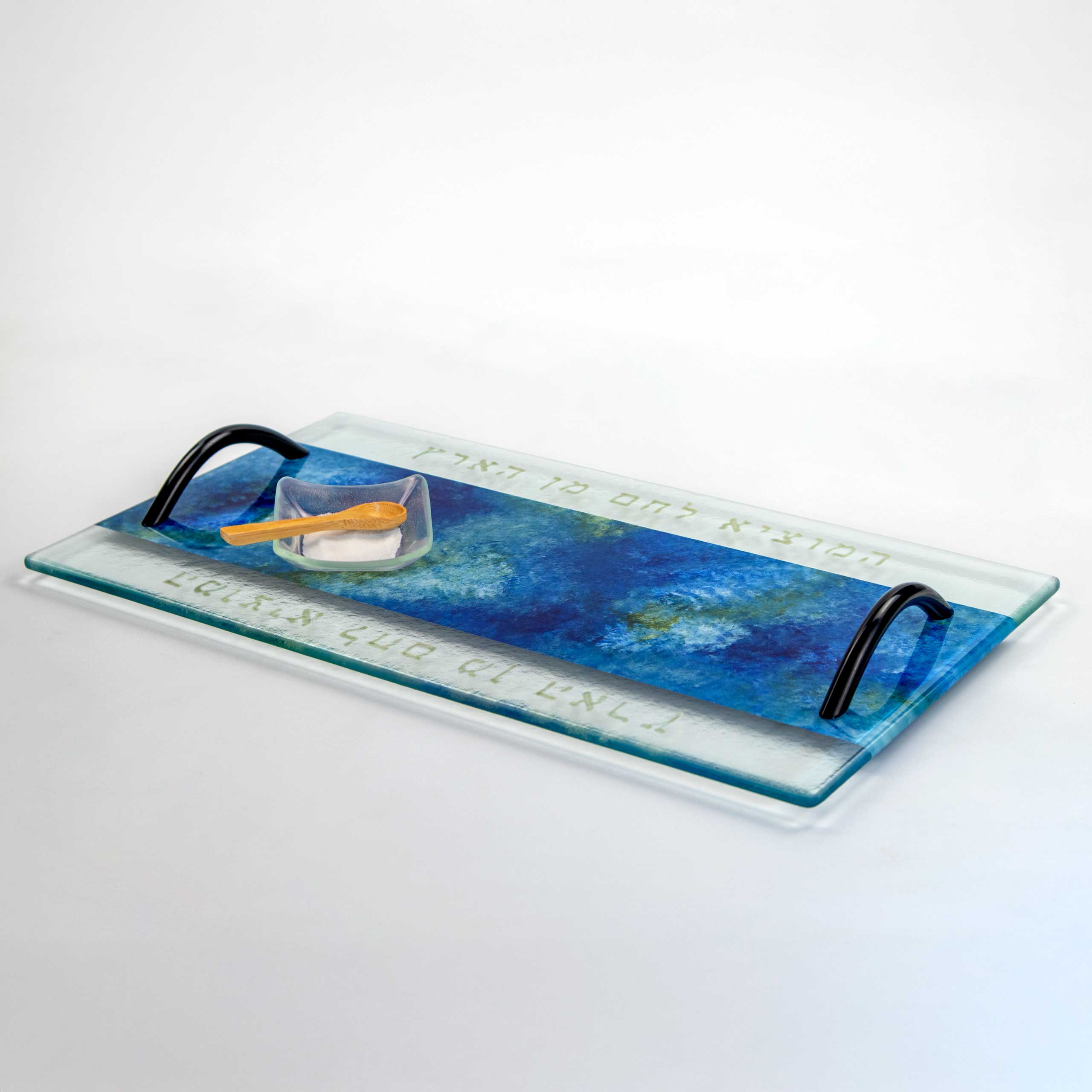 Glass challah board, customizable Hebrew text, salt dish, and wooden spoon.