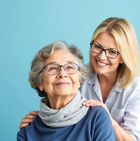 senior with caregiver on blue background.jpg