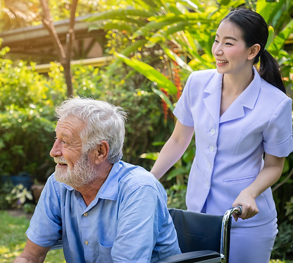 happy-nurse-take-care-elderly-man-wheelchair-garden-nursing-home.jpg