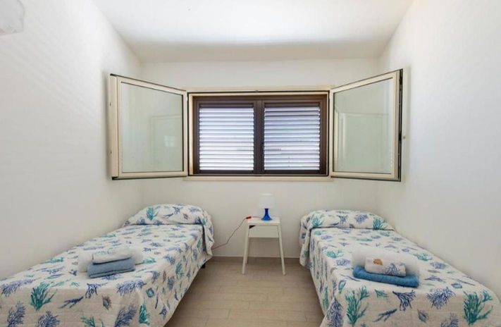 Camera da letto con due letti singoli