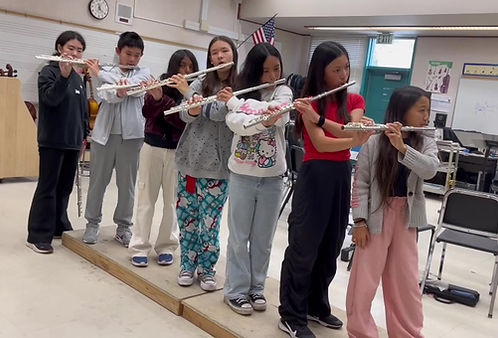 School flute sectional coaching with beginning middle school flute students