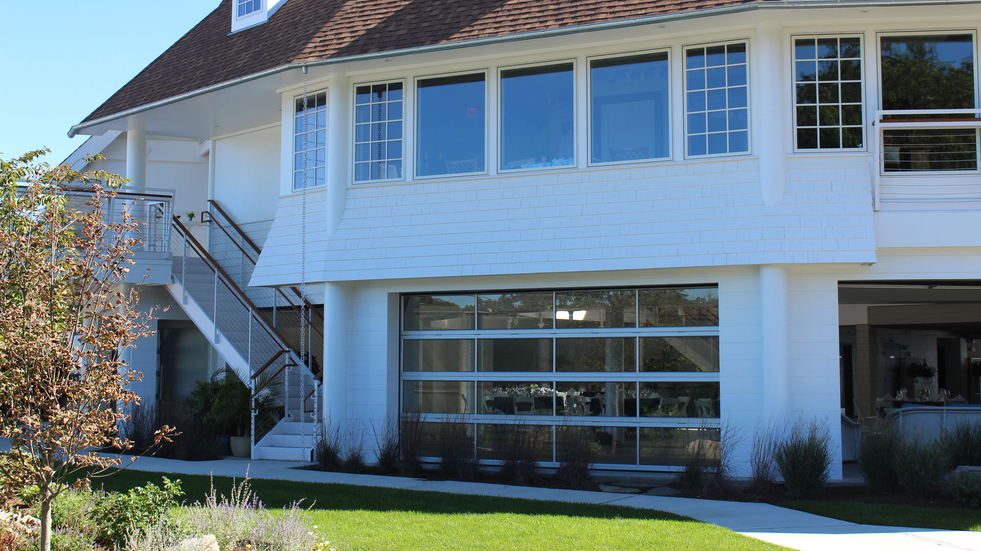 Sovereign stacking-panel system in clubhouse
