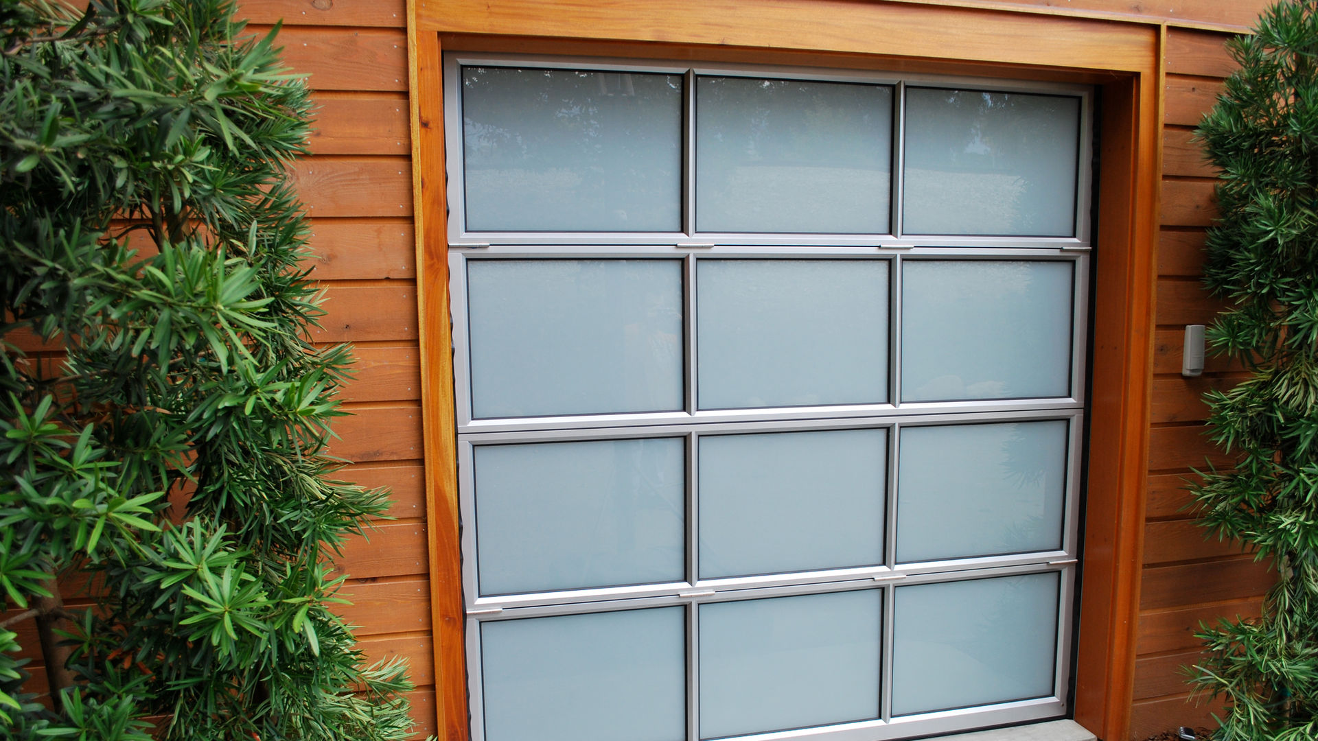 Exterior view of frosted glass Sovereign stacking sectional system.