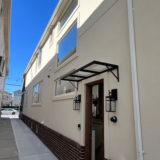 Iron Group's Modern Wrought Iron Railings and Awning