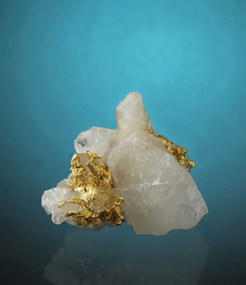 Thumbnail: Spinel Twinned Native Gold Crystals on Quartz - Sonora Mexico